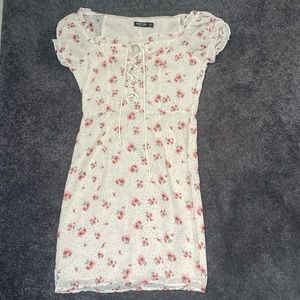 Floral front crisscross sundress from Nasty Gal